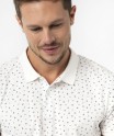 Polo manches courtes en jersey à petits motifs graphiques homme